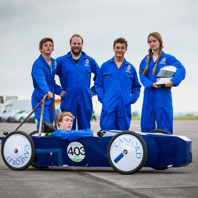 group with car